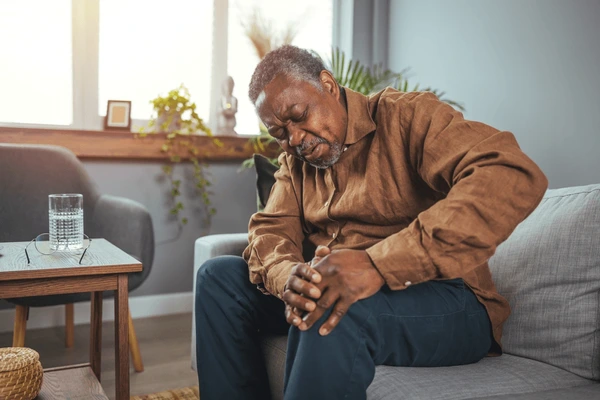 senior-man-holds-his-hands-600nw-2139454187